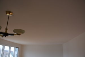 (After) Stucco ceiling sanded and skimmed smooth with plaster and painted